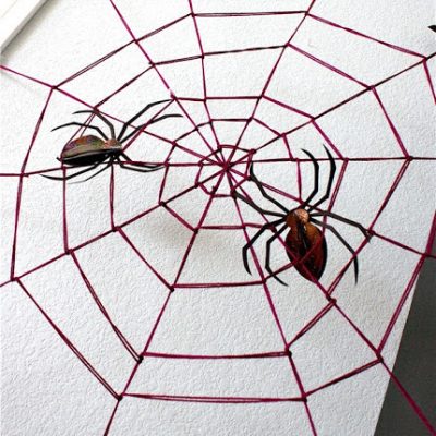 yarn spider web Halloween decoration tutorial from MADE Everyday
