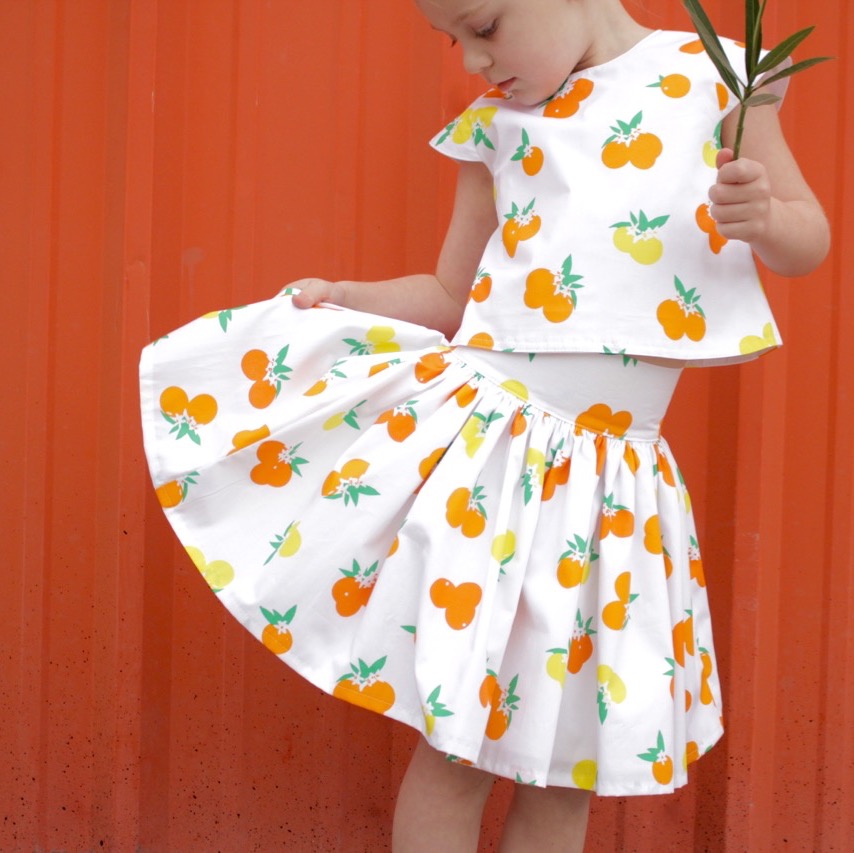 Fiesta Fun fabric collection designed by Dana Willard for Art Gallery Fabrics - Citrus Sunrise print - First Day Dress (top view) and Anywhere Skirt patterns from MADE Everyday